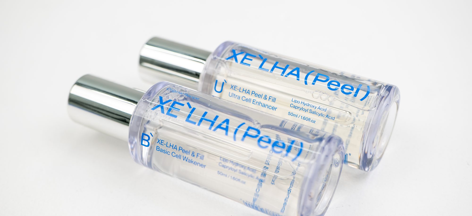 XE'LHA Peel Basic and Ultra bottles side by side