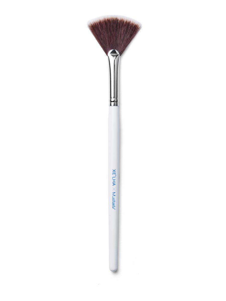 XE'LHA Cleansing Brush, a white-handled fan brush