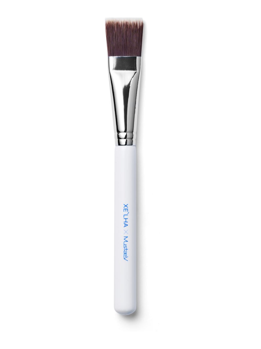 XE'LHA Peeling Brush, a white-handled flat brush